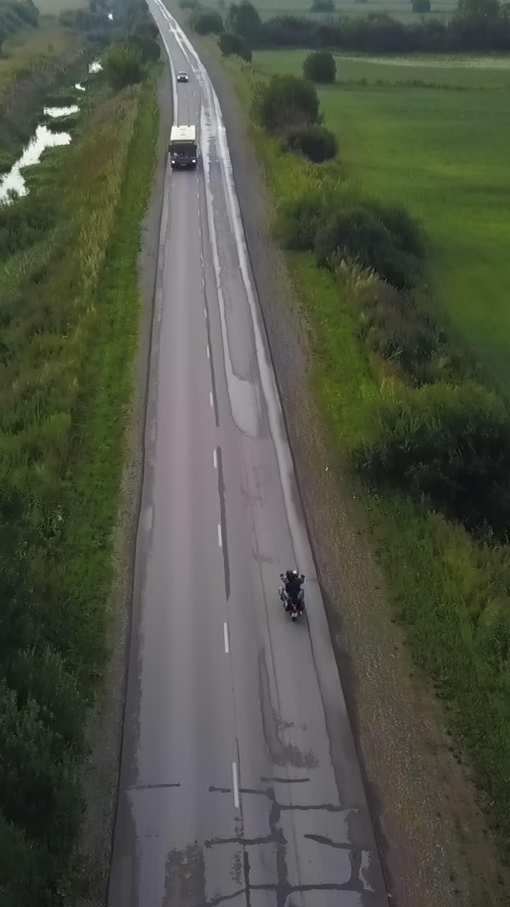 Aerial view of vehicles on a rural road