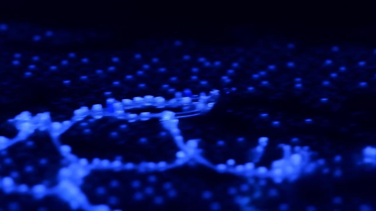 Abstract motion scene with bright luminous blue strands and clustered dots forming low wavy lines across deep navy background, suggesting flowing movement, soft depth, and moody futuristic energy