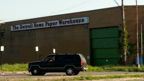 Cars-Pulling-Up-at-Derelict-Warehouses