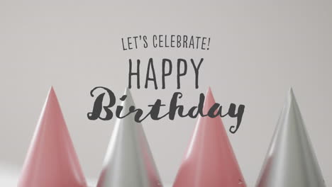 animación del texto de feliz cumpleaños sobre sombreros de fiesta en el fondo