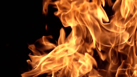 Flames-of-fire-on-black-background-in-slow-motion