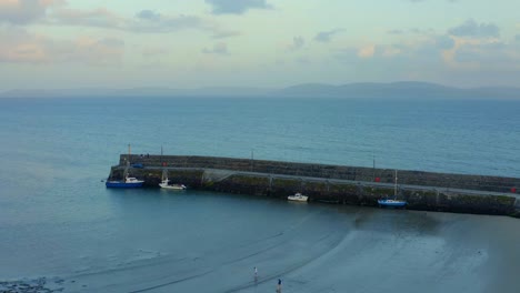 Aerial-timelapse-of-Spiddal-Pier,-Galway-Bay