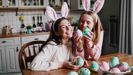 friends celebrating easter in the kitchen