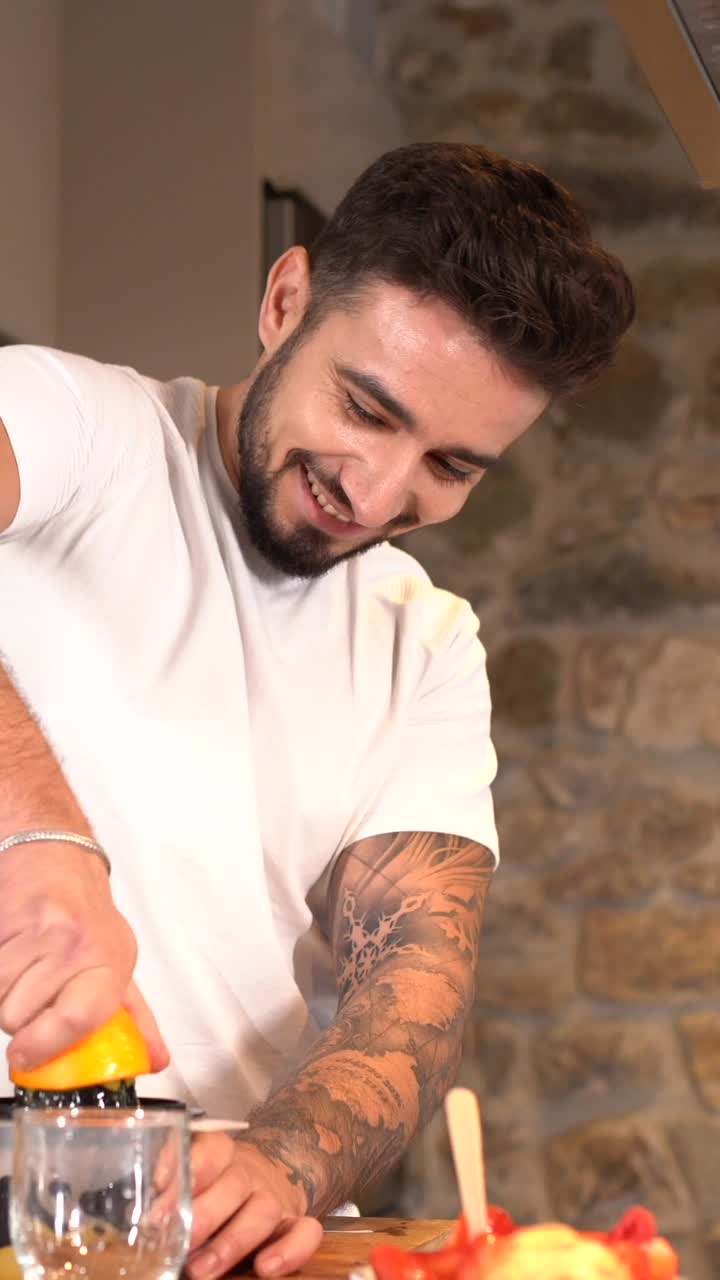 Man making fresh orange juice