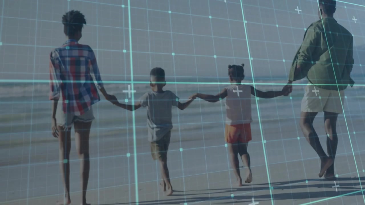 Vertical video: Camera tracking family bonding while walking on wet shore, green jacket, blue grid