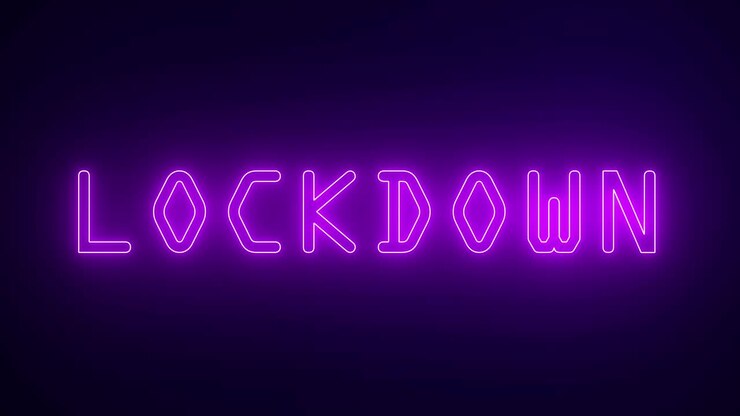 Insegna al neon luminosa animata con la scritta Lockdown su sfondo blu.