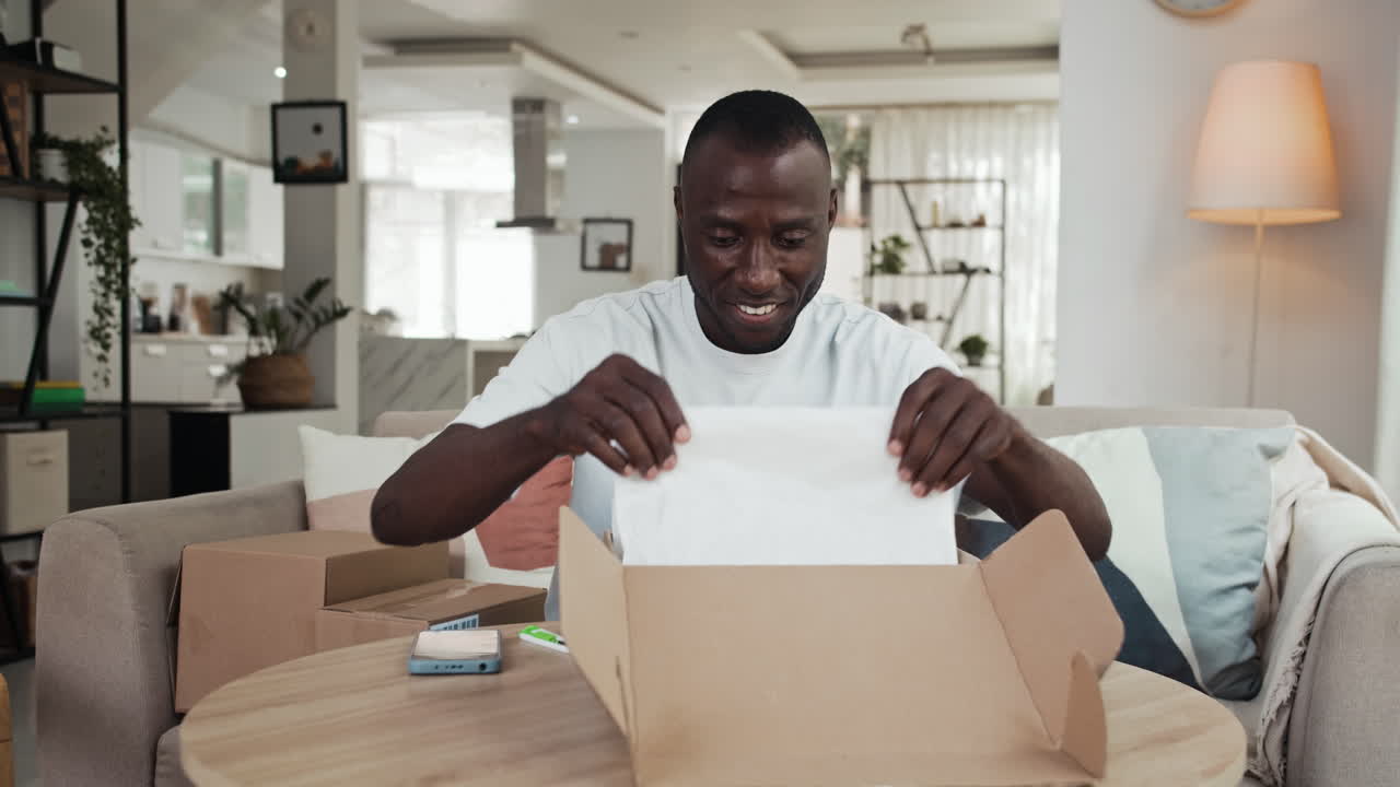 Happy Male Buyer Getting Parcel with Shoes at Home