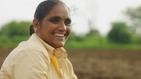 indian woman farming in a field