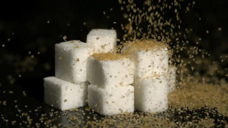 golden sugar falling onto sugar cubes