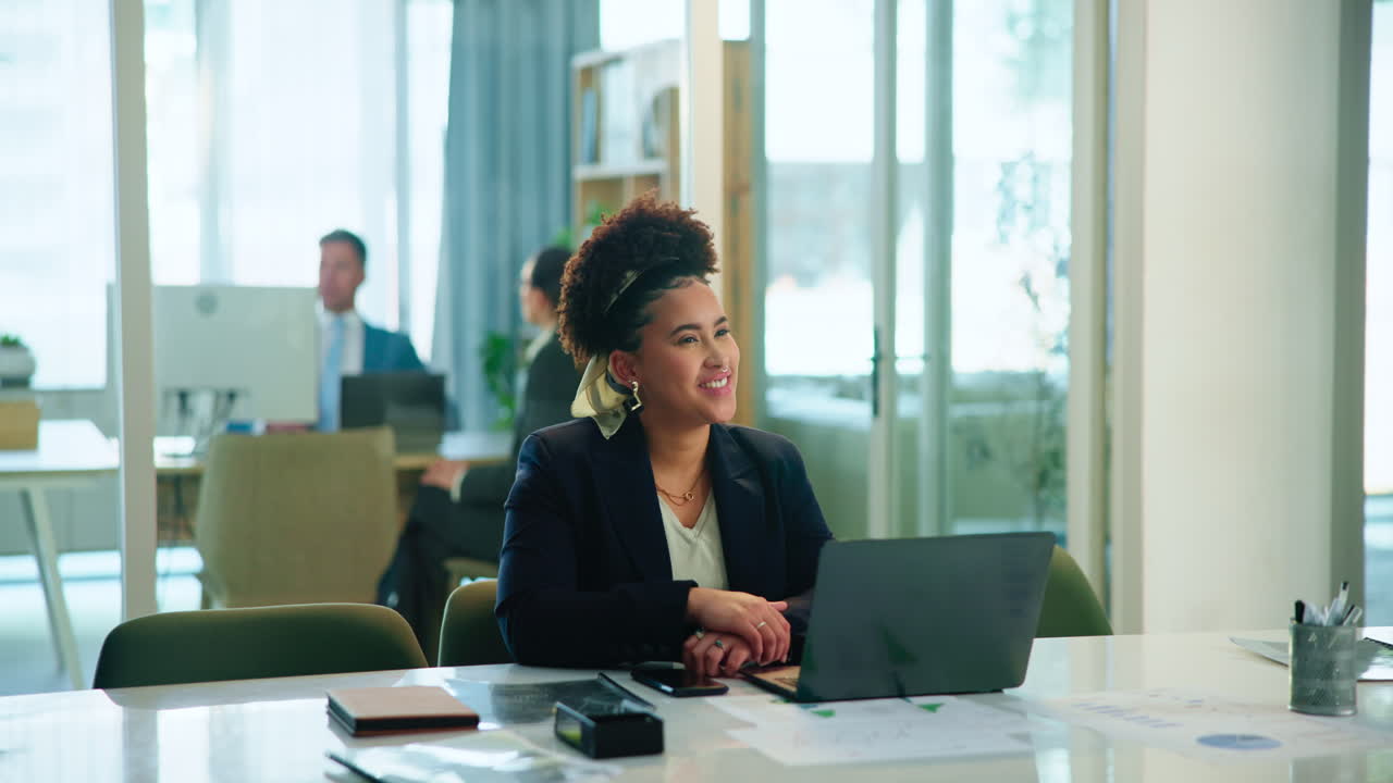 Businesswoman and Businessman Shaking Hands in an Office Meeting