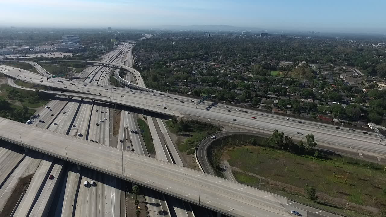 Aerial drone footage over Orange County Freeways - the Orange Crush.