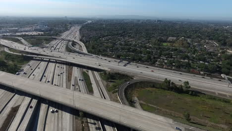 aerial drone footage over orange county freeways - the orange crush.