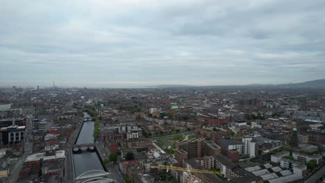 Aerial-panning-shot-of-the-city-of-Dublin-and-Liffey-River-in-Ireland