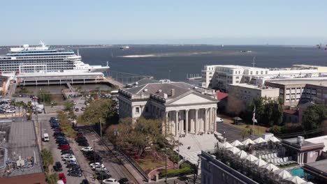 low panning aerial shot of the united states custom house in charleston, south carolina