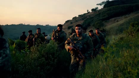 military troops on patrol at sunset