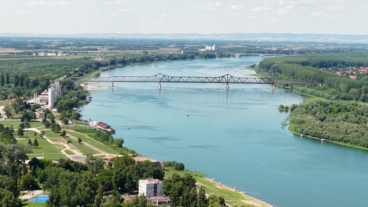 Drone Shot of Sava River and Old Railway Bridge Near Sabac, Serbia on Sunny Summer Day