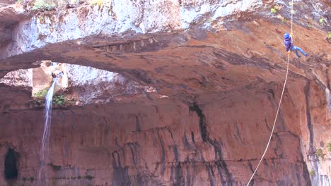 A-waterfall-and-cave-attracts-repellers-and-adventurers-in-the-hills-of-Lebanon--1