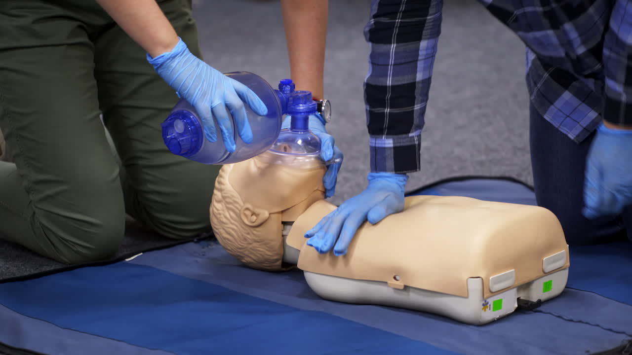 Medical male dummy on blue hospital blanket. Medical equipments for education. First aid training video.