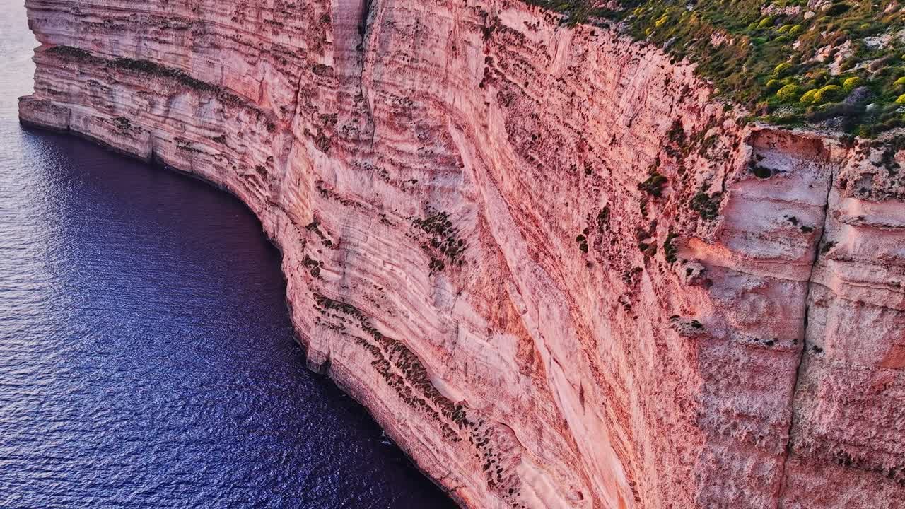 Exploring the cliffs and sea at Malta during sunset hours
