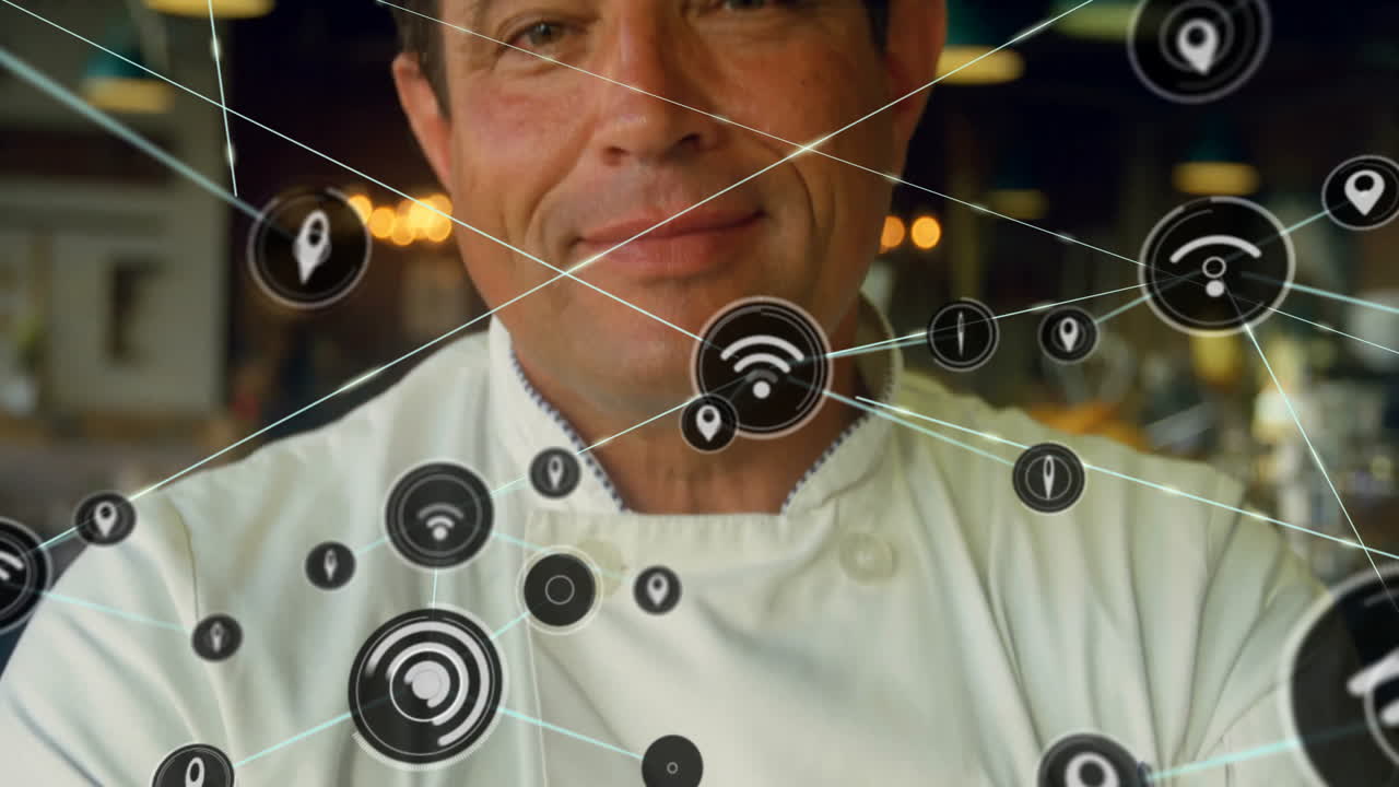 Animation of network of connections with icons over caucasian male chef in kitchen