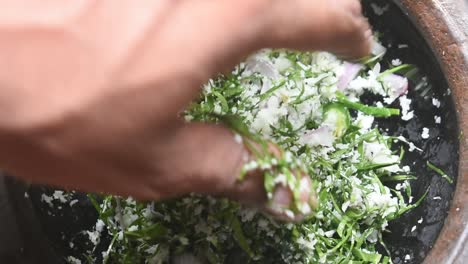 Edible-leaves-called-Dregea-volubilis-making-as-food-in-clay-pot-in-Sri-Lanka