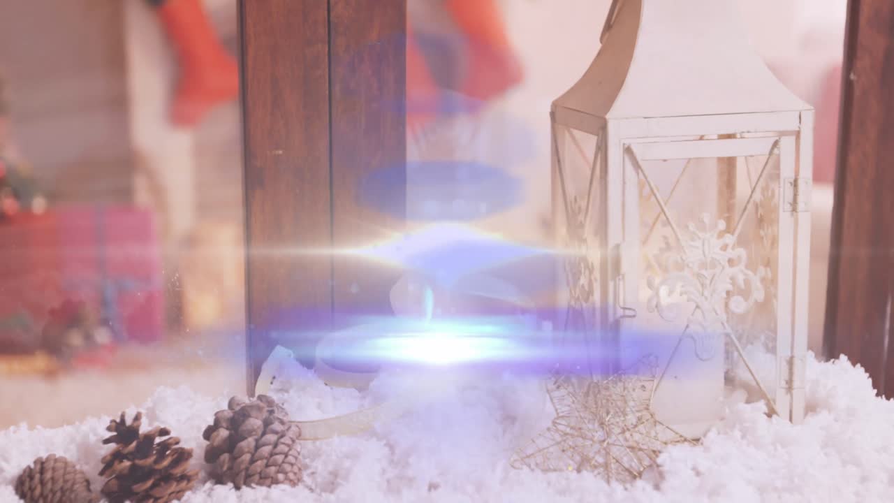 Animation of glowing lights moving over fir tree cones and lantern christmas decorations