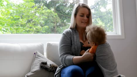 mother playing with her son 4k