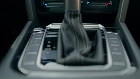 close-up of a car's gear shift and center console