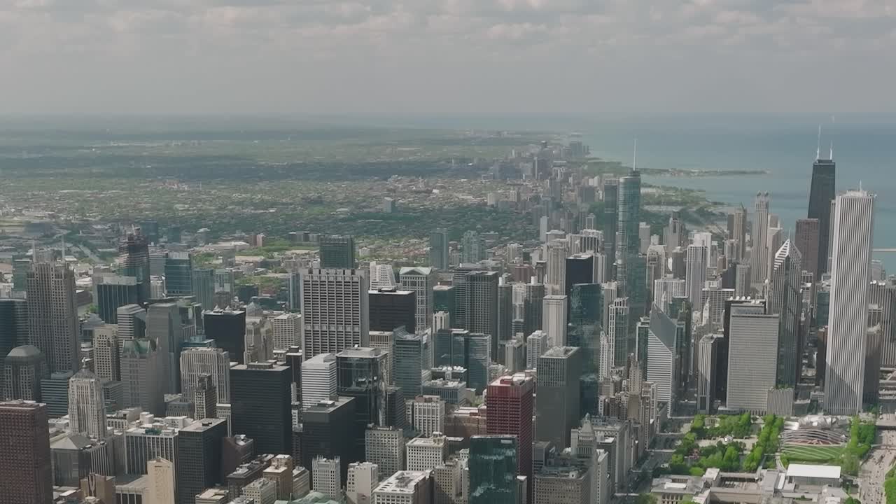 View of downtown Chicago from the sky with buildings and lake
