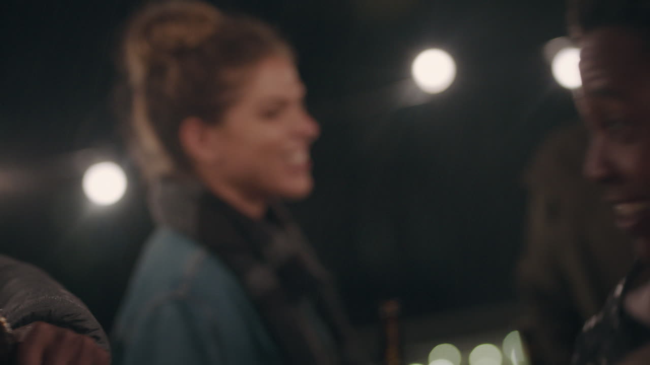 happy rooftop party friends dancing having fun socializing together enjoying reunion celebration chatting sharing drinks celebrating friendship gathering on roof at night