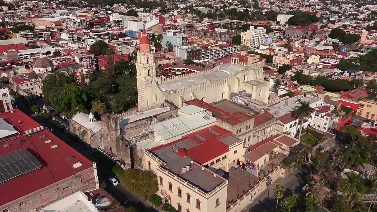 Historic church and colonial buildings in Cuernavaca seen from an aerial view