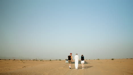 three travelers in the desert