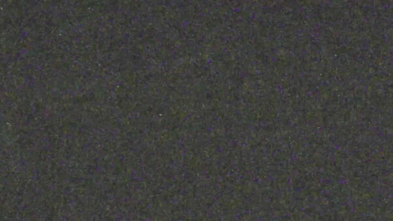 Transición de ruido estático a pantalla negra