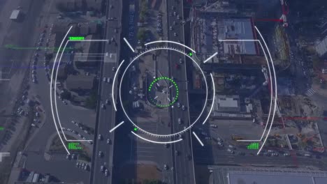 Animation-of-glitch-technique-over-circles-against-aerial-view-of-city-with-vehicles