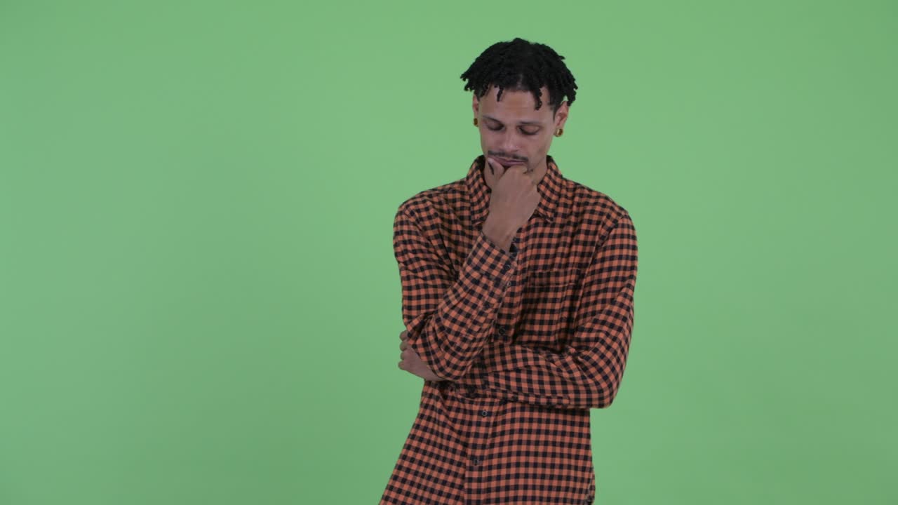 Young handsome African man with dreadlocks