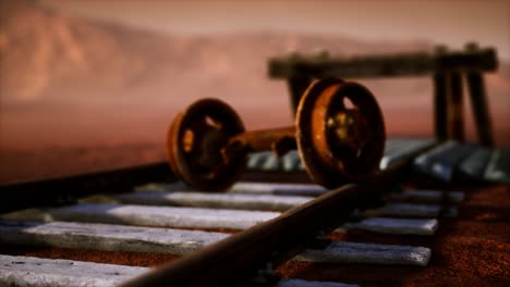 abandoned railway tracks in the desert