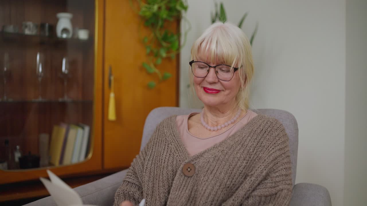 Elderly Woman Reading at Home
