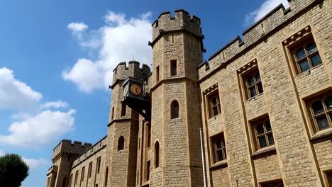 facade of the crown jewels building with a clock