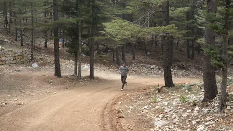 man running in forest