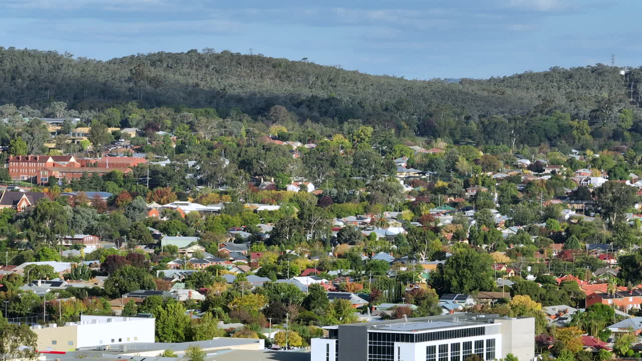 Aerial: Drone shot of residential and commercial buildings in Wagga Wagga, NSW, Australia