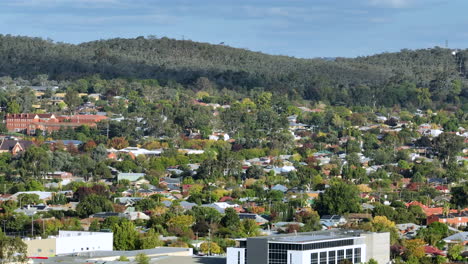 aerial: drone shot of residential and commercial buildings in wagga wagga, nsw, australia