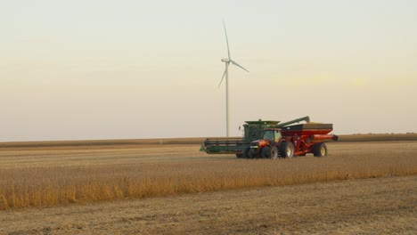 midwest farm being harvested in the brisk october early evening