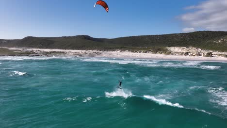 kiteboarding at a beautiful coastal beach