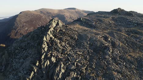 sunrise in snowdonia. drone footage flying over castel y gwynt, glyder fach