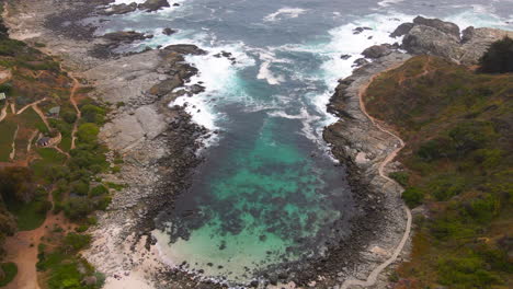 aerial - beautiful rocky bay, zapallar, valparaiso, chile, scenic top down shot