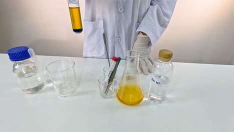 scientist conducts experiment with colorful chemical reactions