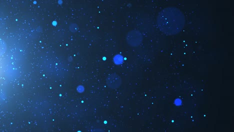 blue bokeh background with glitter particles.4k holiday celebration seamless loop background animation