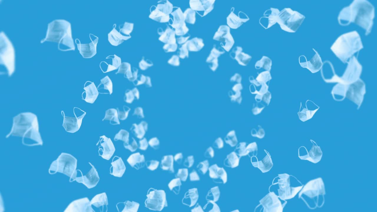 파란색 바탕에 많은 색 마스크를 날리는 의료 개념, 수술 보호 마스크, 마스크 회전의 3d 애니메이션, 루프 애니메이션.