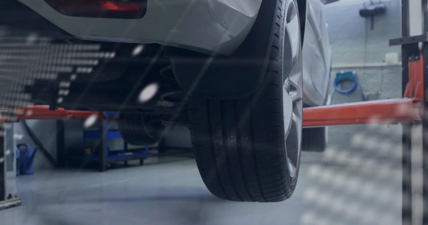 Rear-right wheel on auto lift while camera moving in, dotted map tagging tread for diagnostic