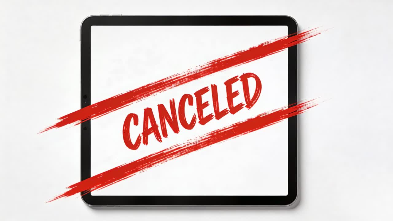 Red marker entering frame sweeping tablet creating red strokes leaving CANCELED for business